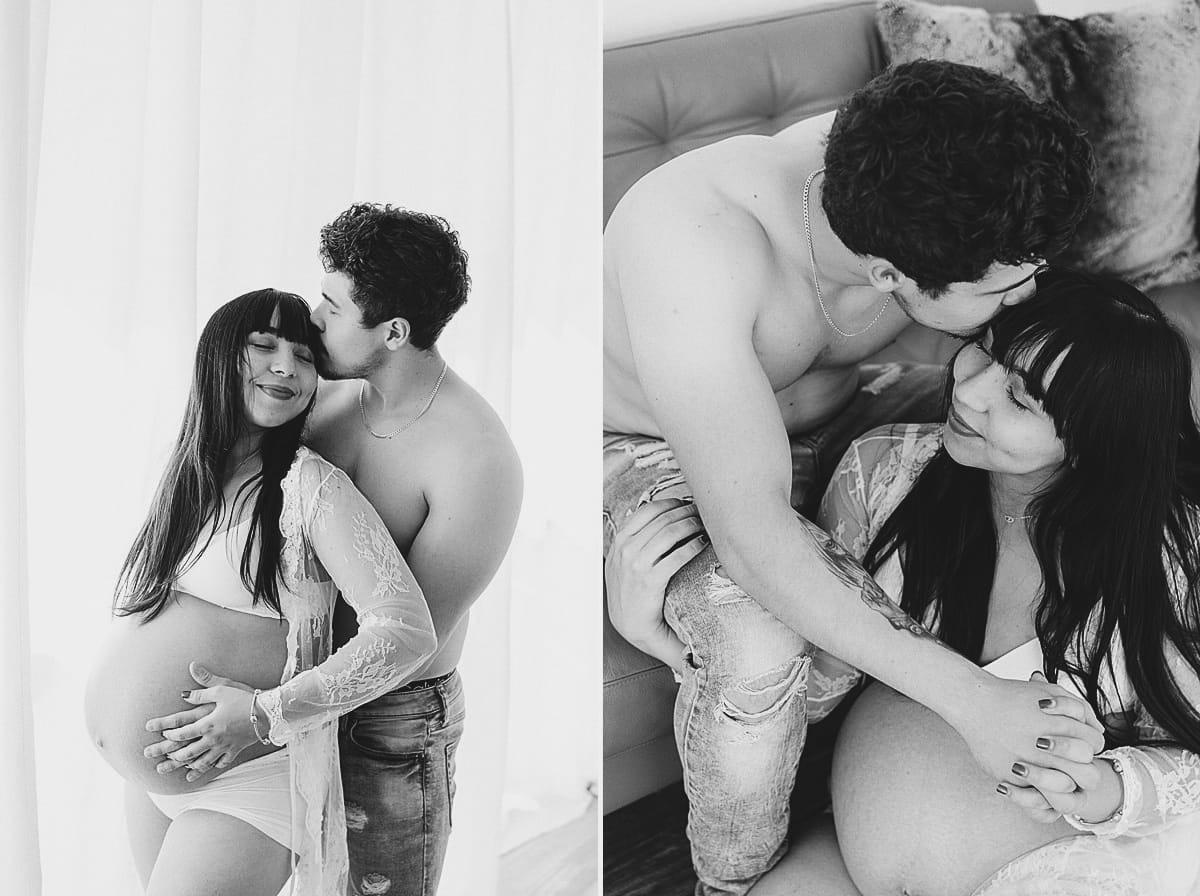 Romantic indoor maternity session with couple embracing and kissing, styled in lace and jeans.