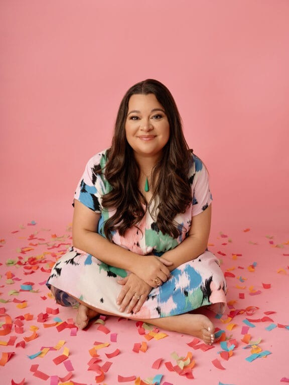 phoenix fun branding photo of woman sitting on the floor with confetti