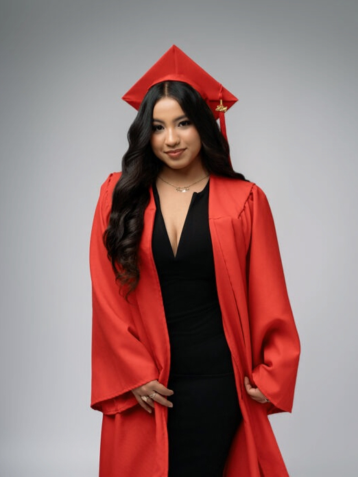 girl wearing graduation cap and gown for her studio phoenix photoshoot
