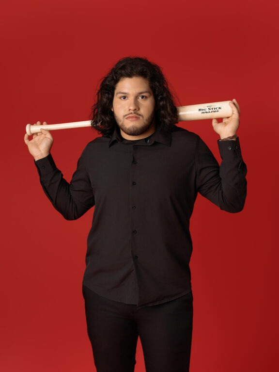 creative senior portrait session with a baseball bat